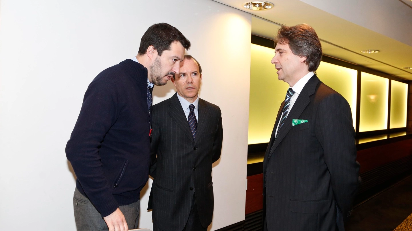 Matteo Salvini in una foto con Gianluca Savoini e Claudio D'Amico (Imagoeconomica) 